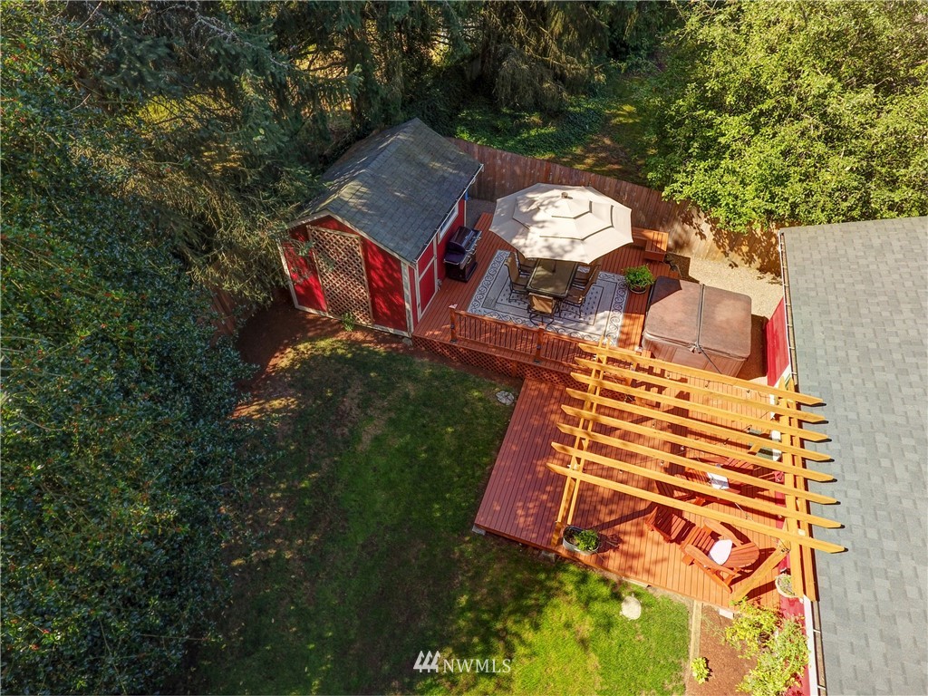 2 222nd Street Southwest Bothell, WA 98021 - Photo 27 of 29 swimming pool view with sitting space and garden view