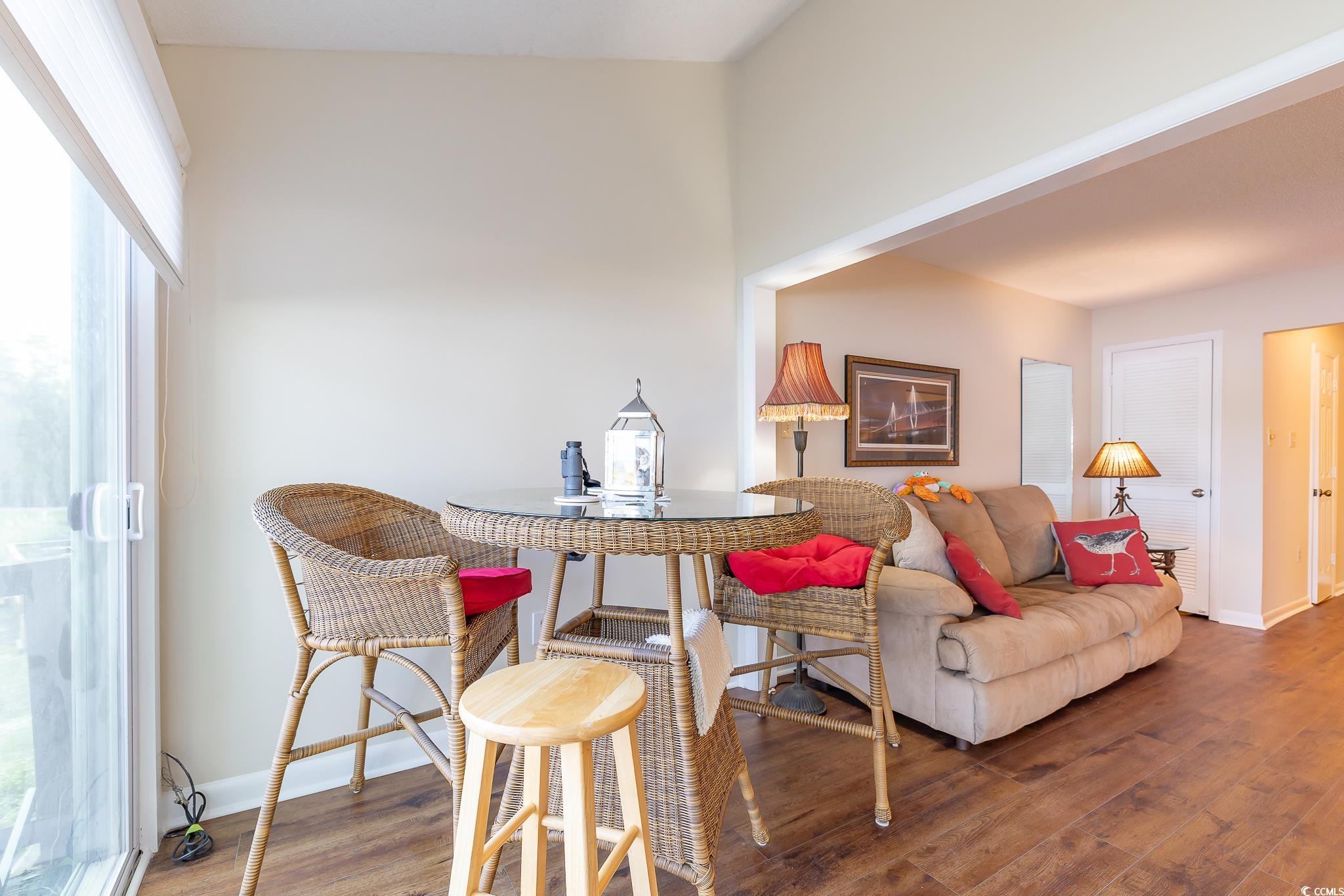 117 Finch Drive, Unit 272 Georgetown, SC 29440 - Photo 21 of 36 Dining area with wood finished floors and baseboards