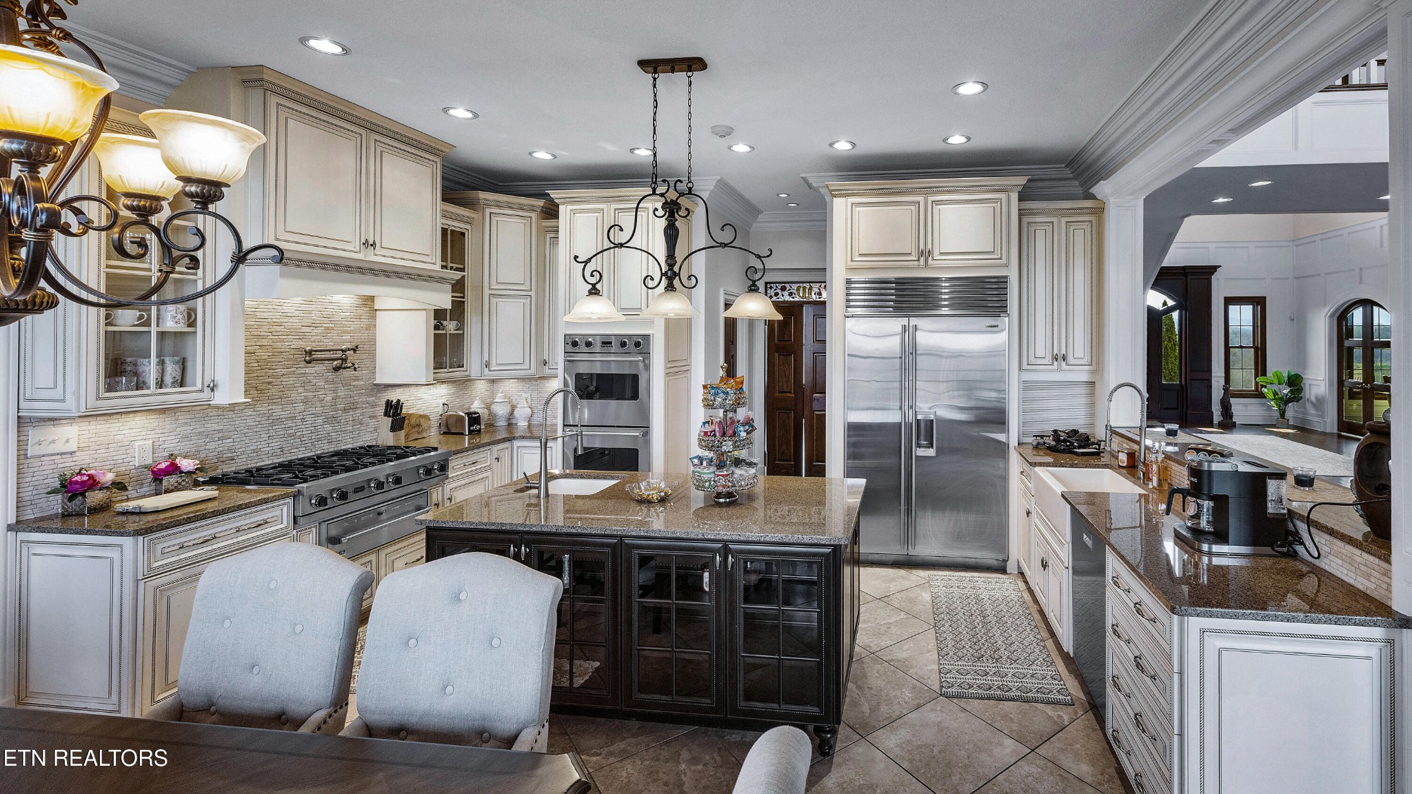 3050 Sims Road Sevierville, TN 37876 - Photo 23 of 59 a kitchen with stainless steel appliances granite countertop a sink stove and refrigerator