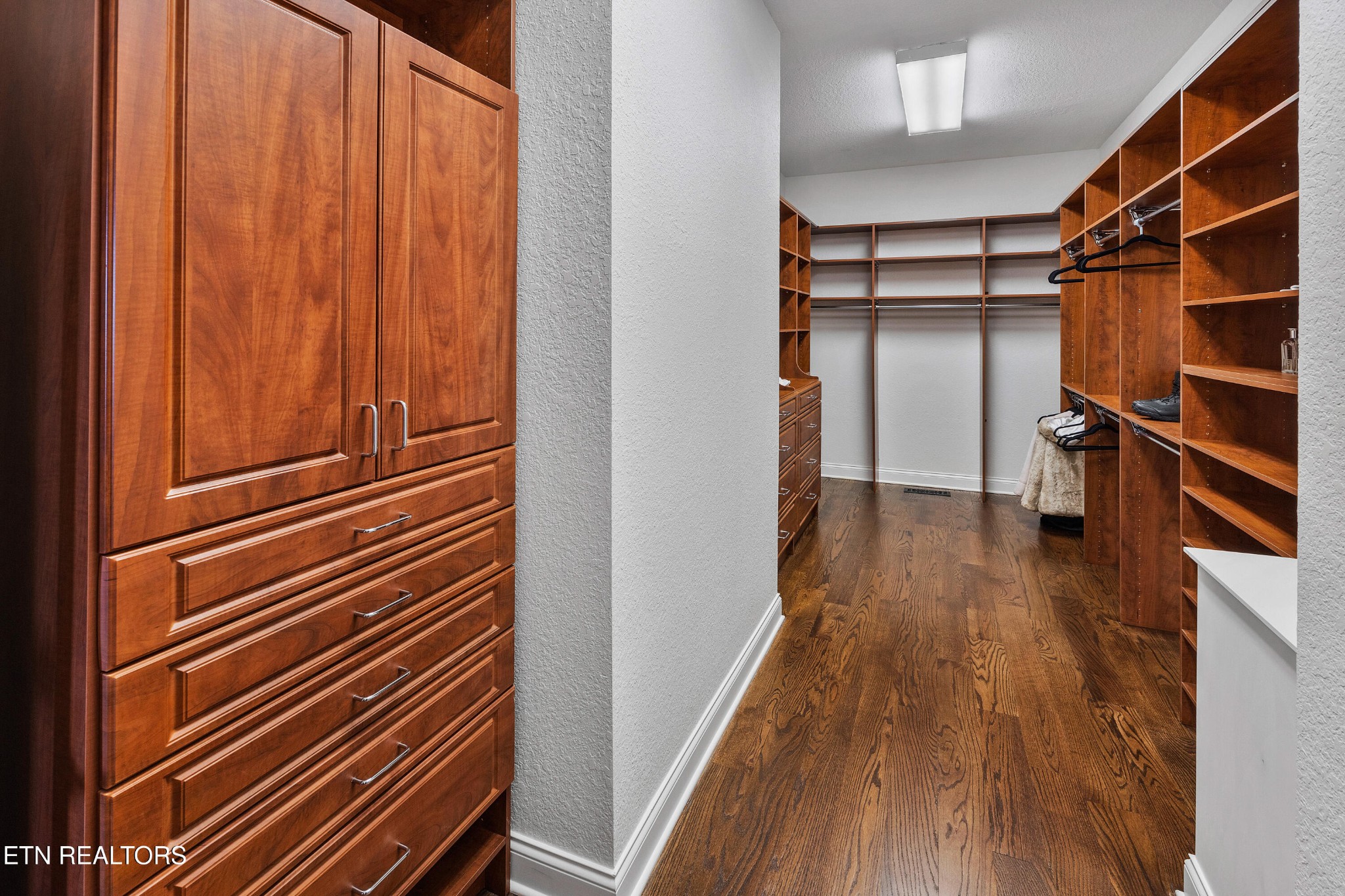 3050 Sims Road Sevierville, TN 37876 - Photo 37 of 59 a view of walk in closet with wooden floor