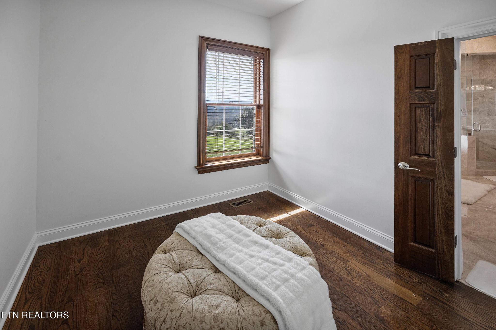 3050 Sims Road Sevierville, TN 37876 - Photo 41 of 59 a bedroom with a bed and wooden floor
