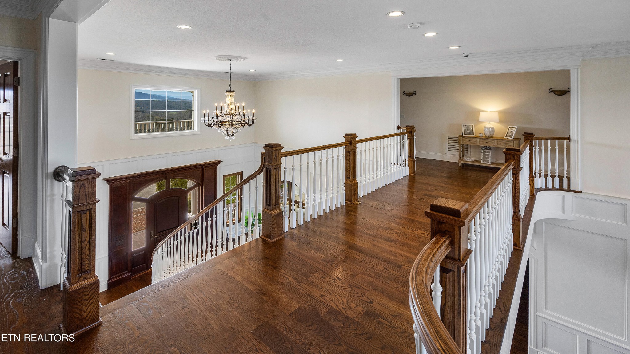 3050 Sims Road Sevierville, TN 37876 - Photo 42 of 59 a view of a hallway with wooden floor and stairs