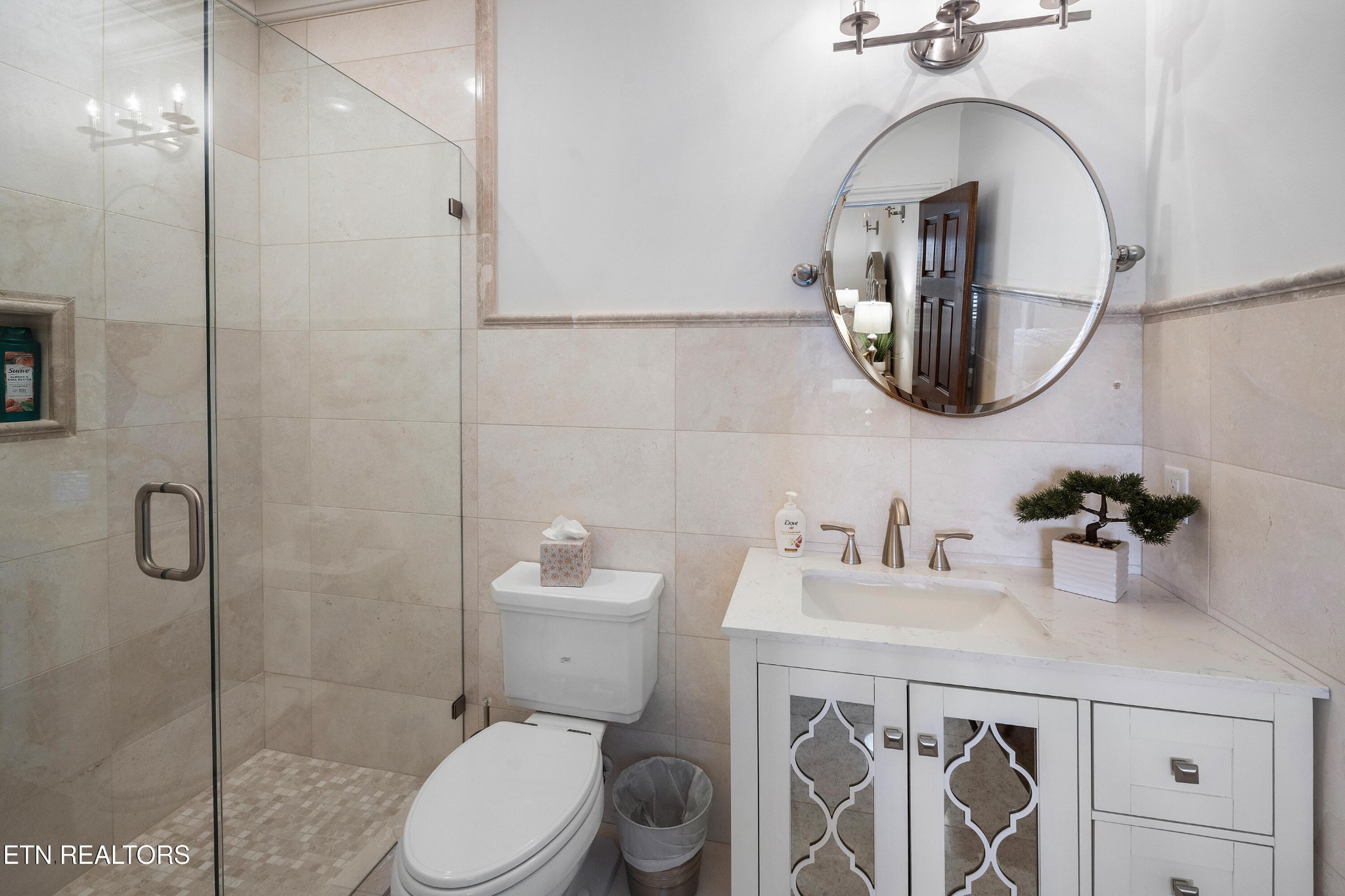 3050 Sims Road Sevierville, TN 37876 - Photo 47 of 59 a bathroom with a toilet sink and mirror