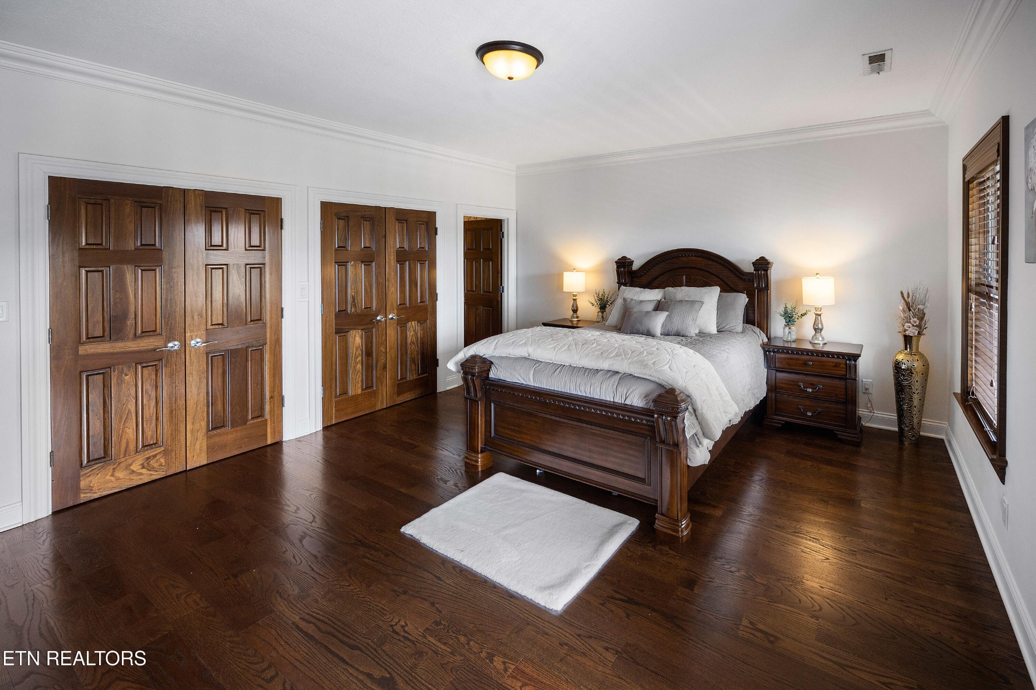 3050 Sims Road Sevierville, TN 37876 - Photo 50 of 59 a bedroom with bed and wooden floor