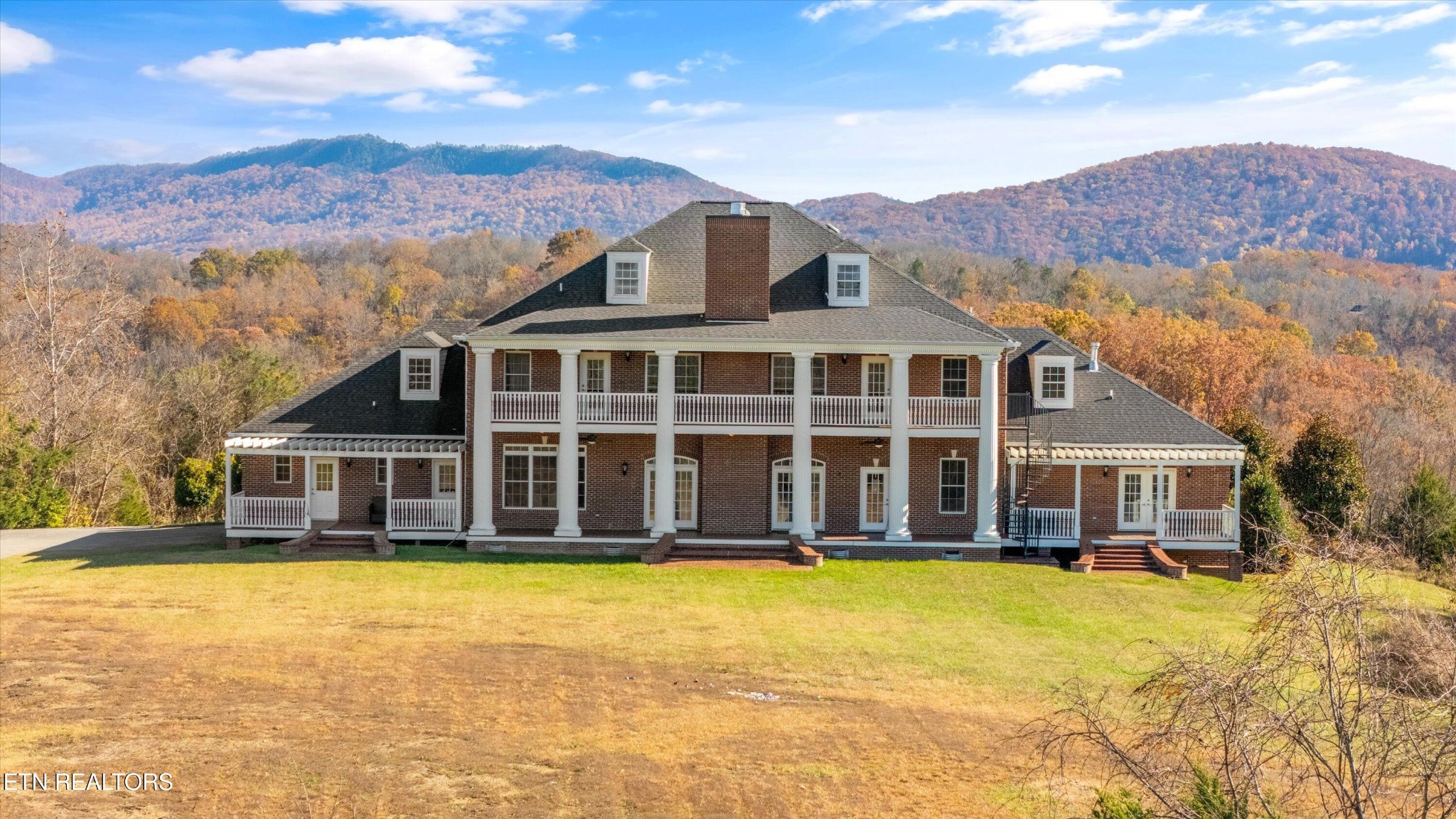 3050 Sims Road Sevierville, TN 37876 - Photo 51 of 59 a view of a house with a swimming pool and mountain view