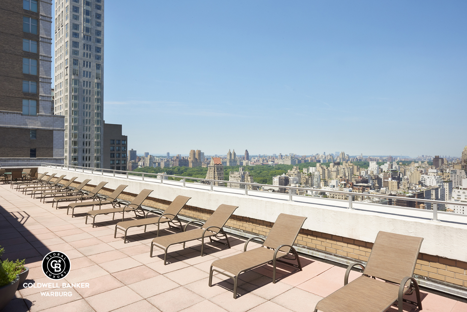 118 East 60th Street, Unit 7B Manhattan, NY 10022 - Photo 13 of 15 a view of a terrace with chairs and a floor to ceiling window