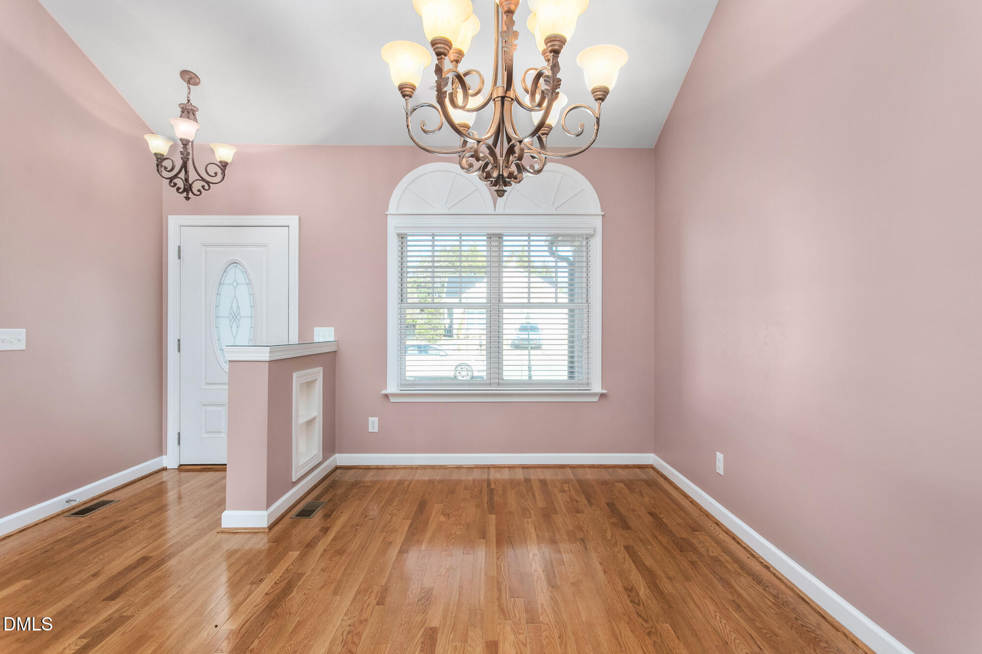 520 Grandview Drive Graham, NC 27253 - Photo 9 of 32 a view of empty room with wooden floor and fan