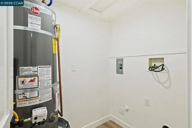 a bathroom with a shower sink and mirror