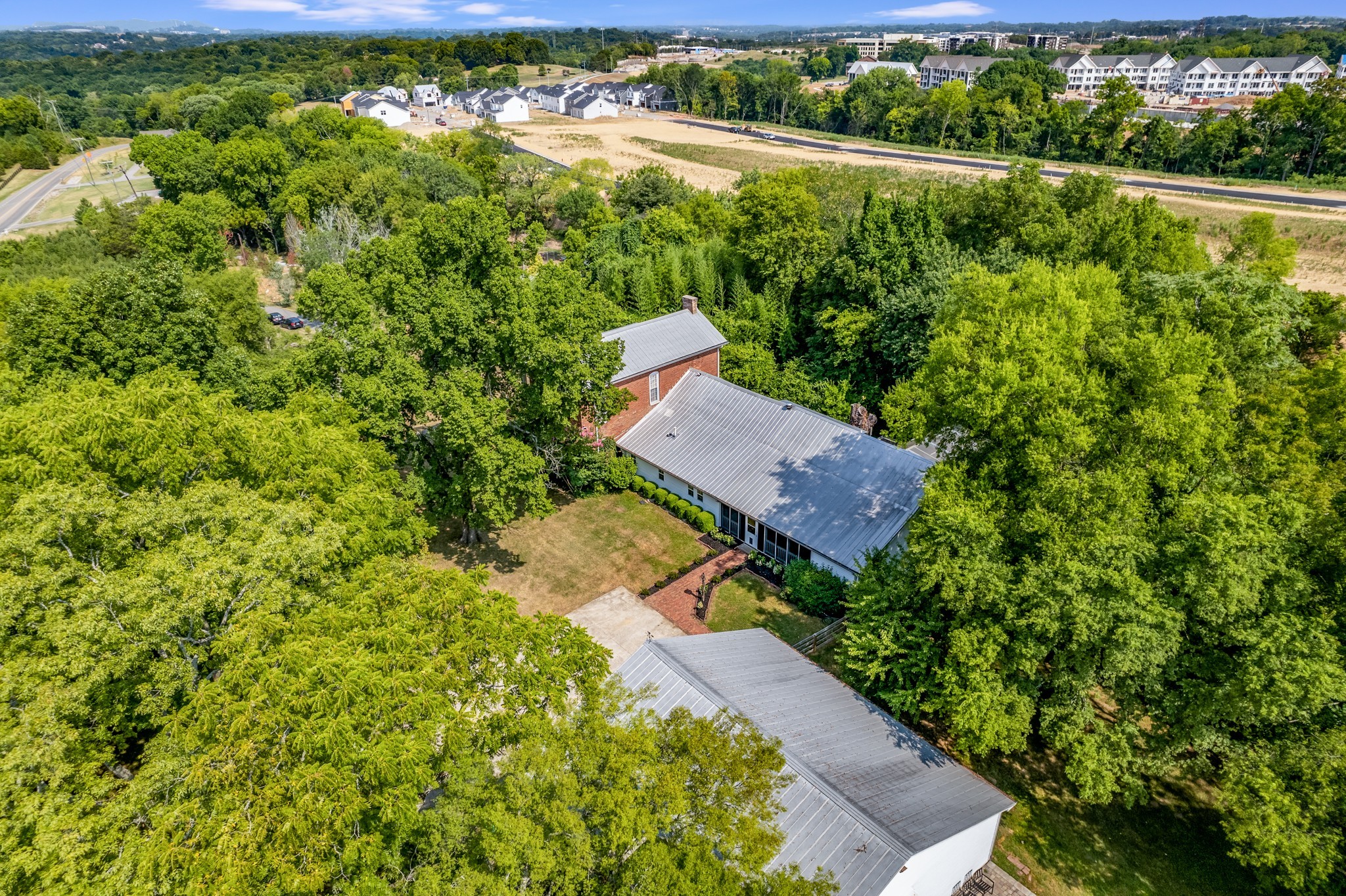5704 Cane Ridge Road Antioch, TN 37013 - Photo 45 of 50 an aerial view of a house with a garden