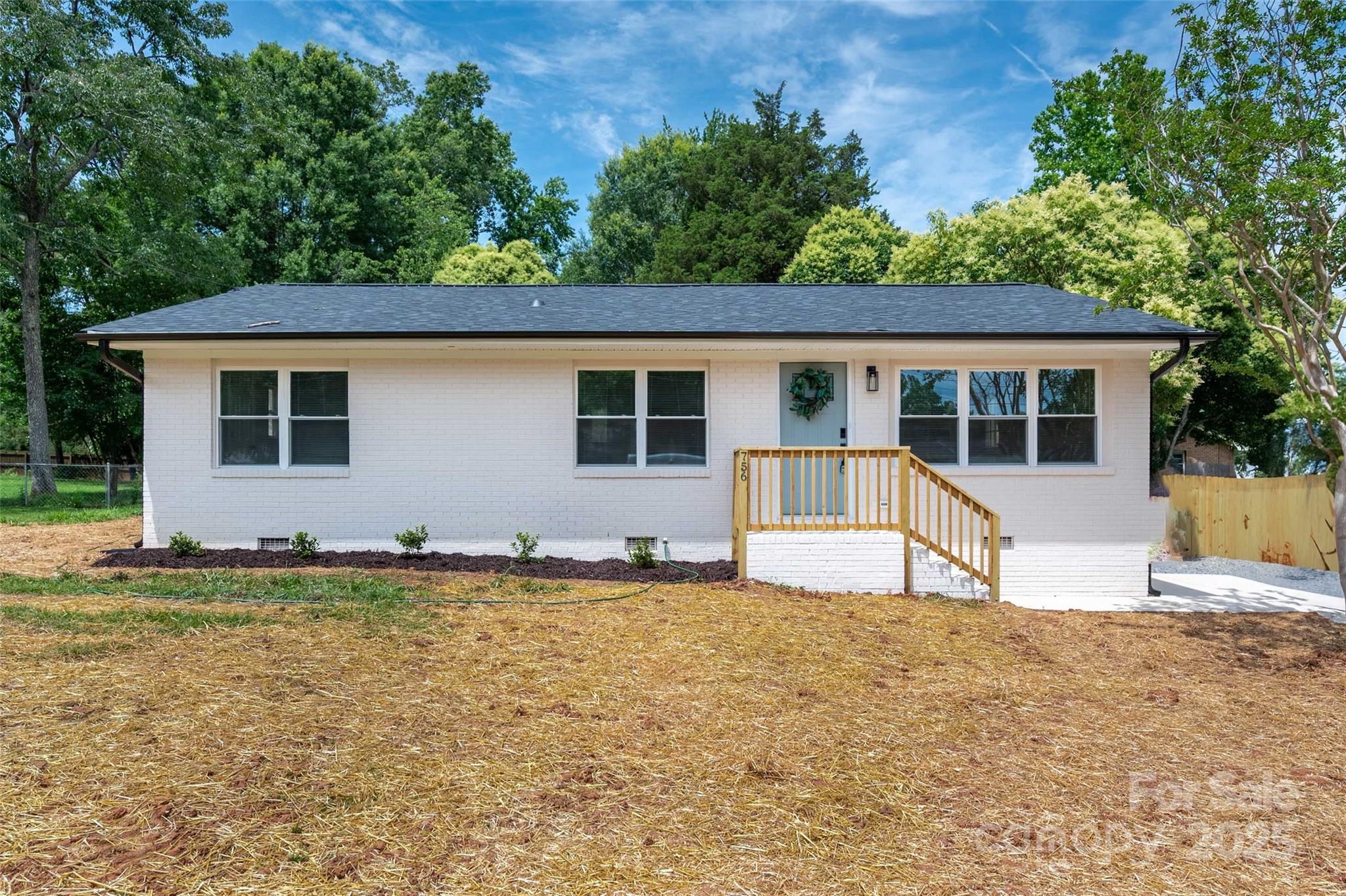 a house view with a outdoor space