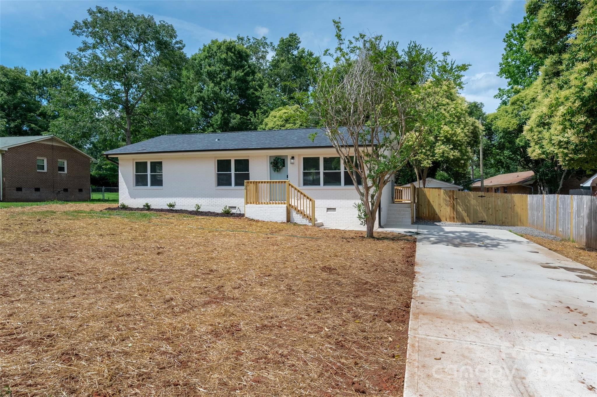 756 Logan Street Mooresville, NC 28115 - Photo 2 of 30 front view of a house with a yard
