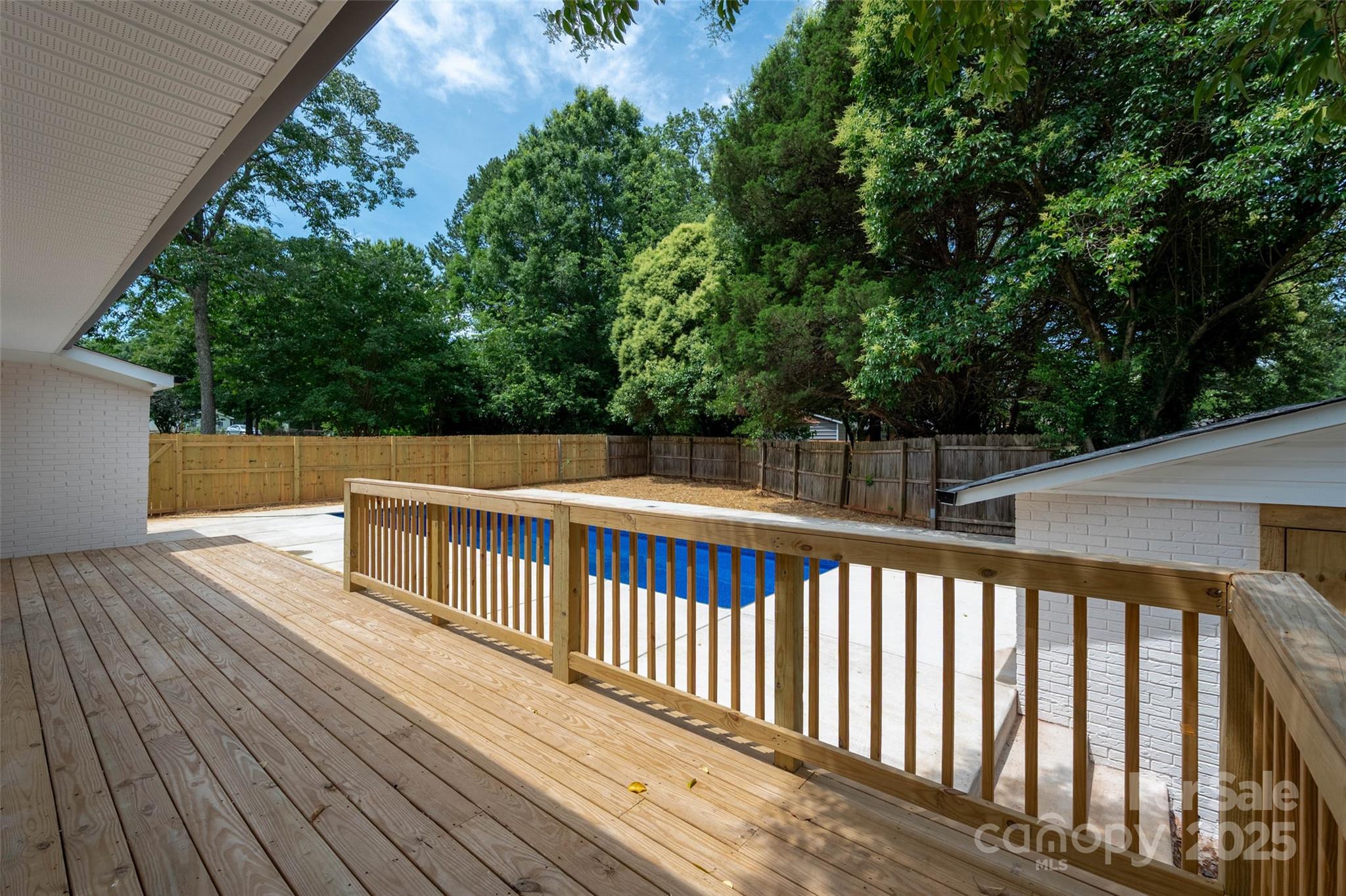 756 Logan Street Mooresville, NC 28115 - Photo 21 of 30 a view of deck with a large trees