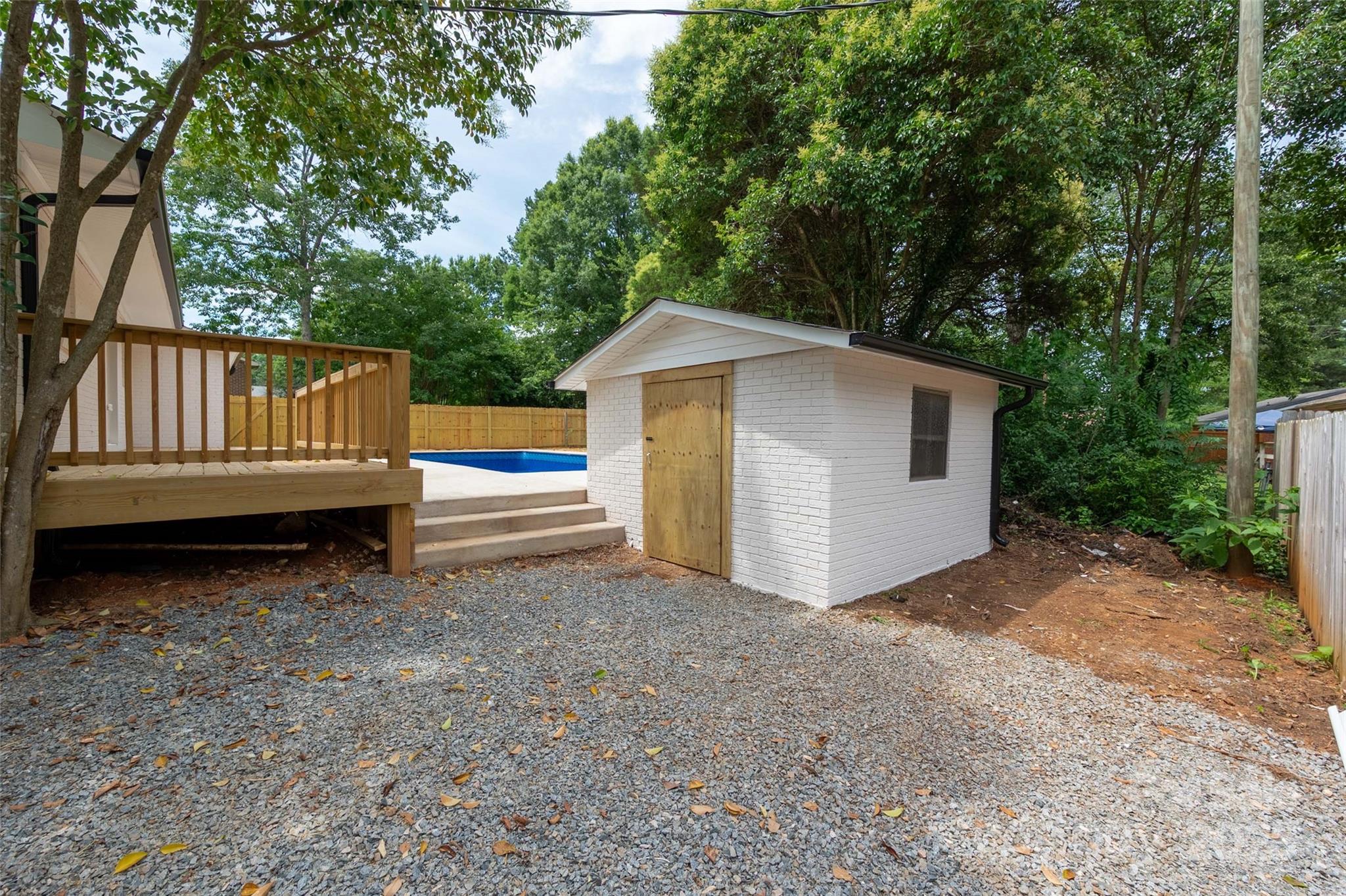 756 Logan Street Mooresville, NC 28115 - Photo 29 of 30 a view of a house with a yard and sitting area