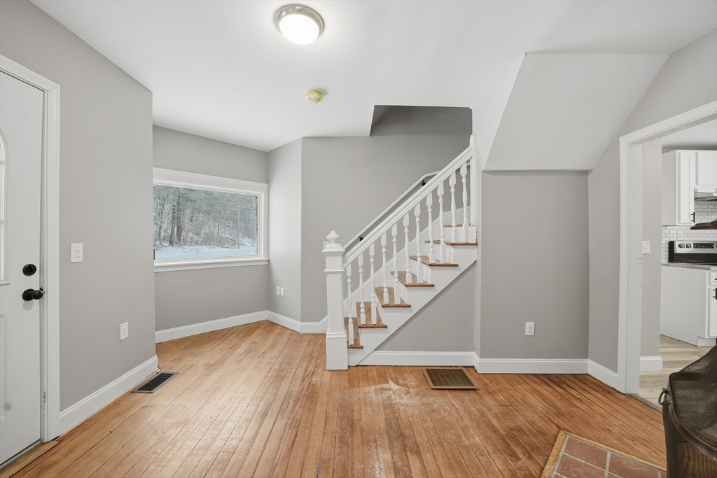 1209 Brimfield Road Warren, MA 01083 - Photo 13 of 41 a view of entryway with wooden floor