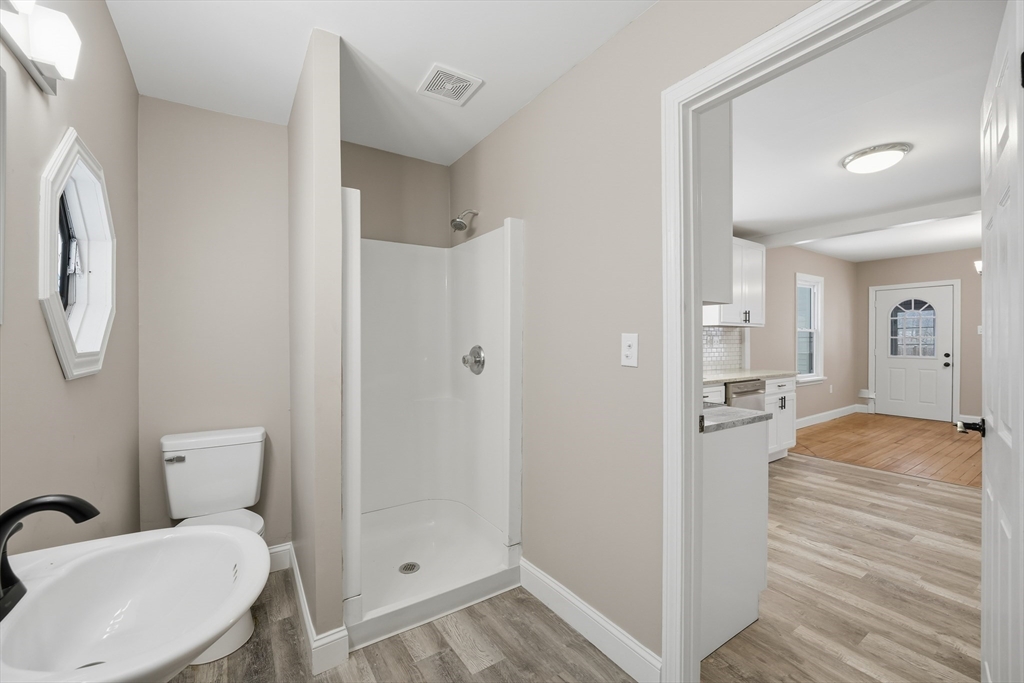 1209 Brimfield Road Warren, MA 01083 - Photo 16 of 41 a bathroom with a sink and a mirror