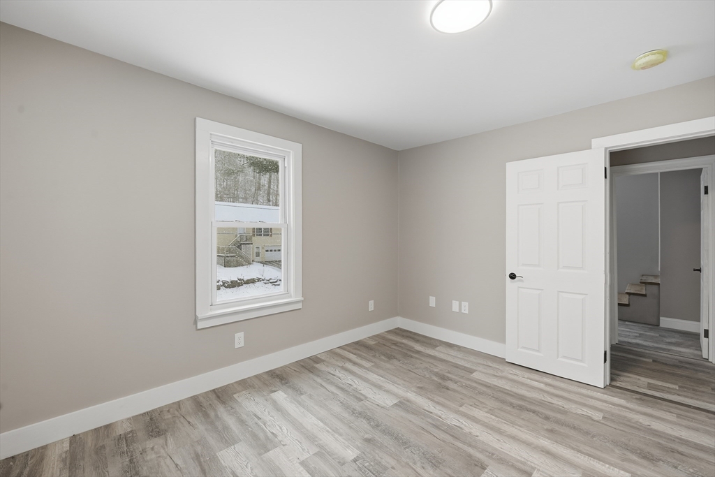 1209 Brimfield Road Warren, MA 01083 - Photo 21 of 41 wooden floor and windows in a room