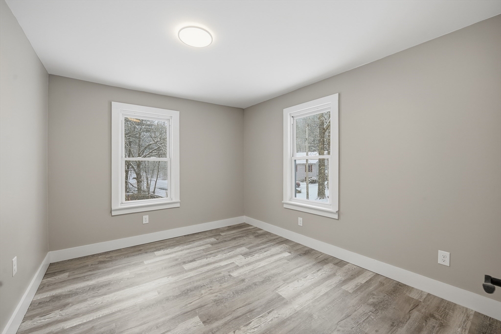 1209 Brimfield Road Warren, MA 01083 - Photo 23 of 41 a view of an empty room with a window and closet area