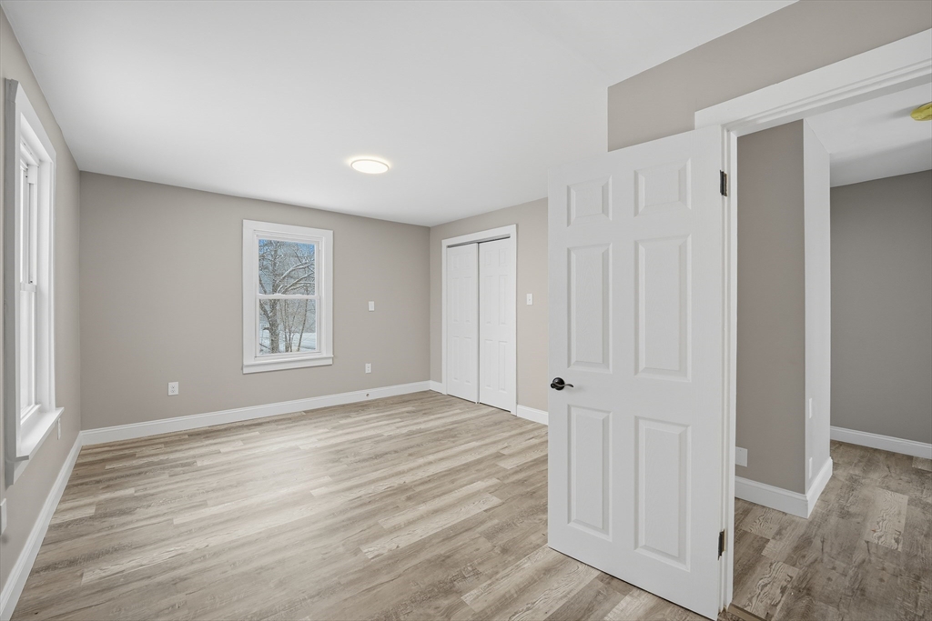 1209 Brimfield Road Warren, MA 01083 - Photo 24 of 41 a view of an empty room with a window