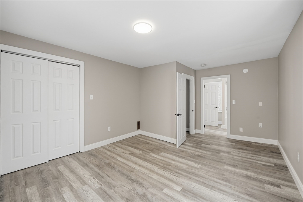 1209 Brimfield Road Warren, MA 01083 - Photo 25 of 41 a view of an empty room and wooden floor