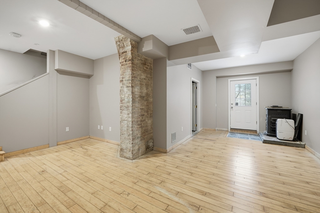 1209 Brimfield Road Warren, MA 01083 - Photo 30 of 41 a view of empty room with wooden floor