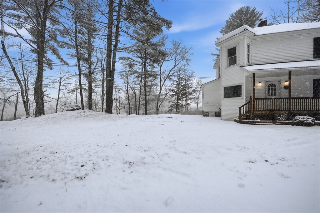 1209 Brimfield Road Warren, MA 01083 - Photo 38 of 41 a view of a house with a snow in the yard