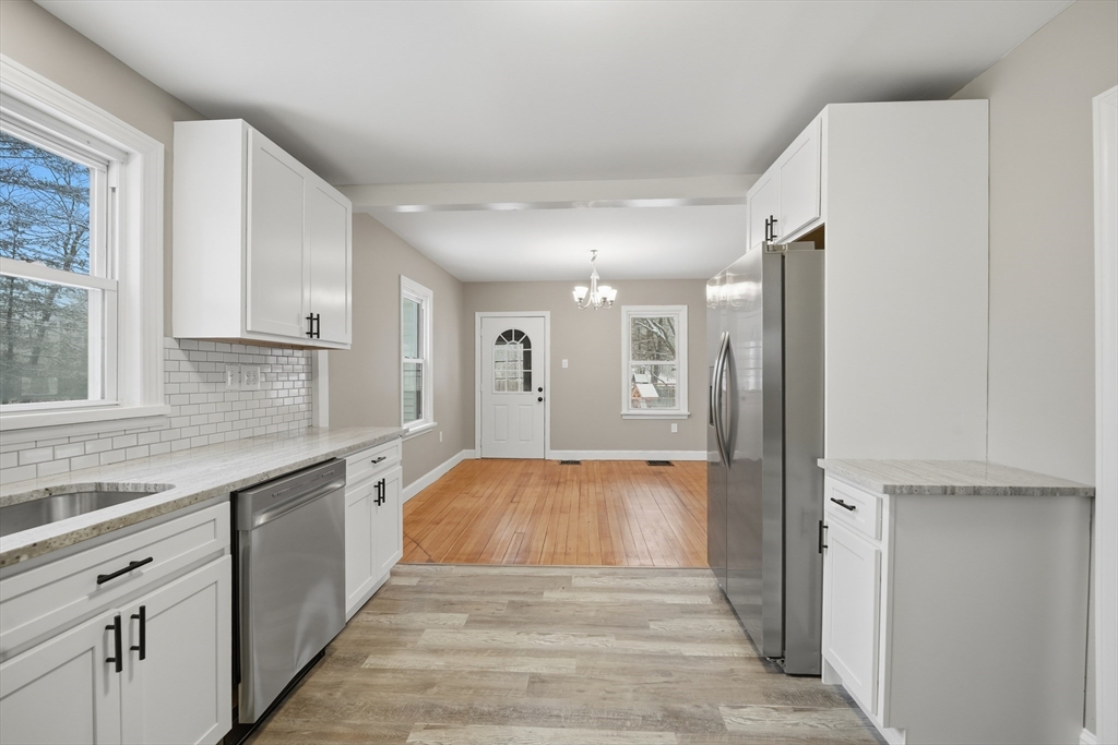 1209 Brimfield Road Warren, MA 01083 - Photo 6 of 41 a view of a kitchen from the hallway