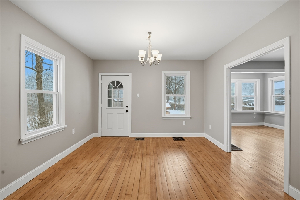 1209 Brimfield Road Warren, MA 01083 - Photo 7 of 41 wooden floor in an empty room with a window