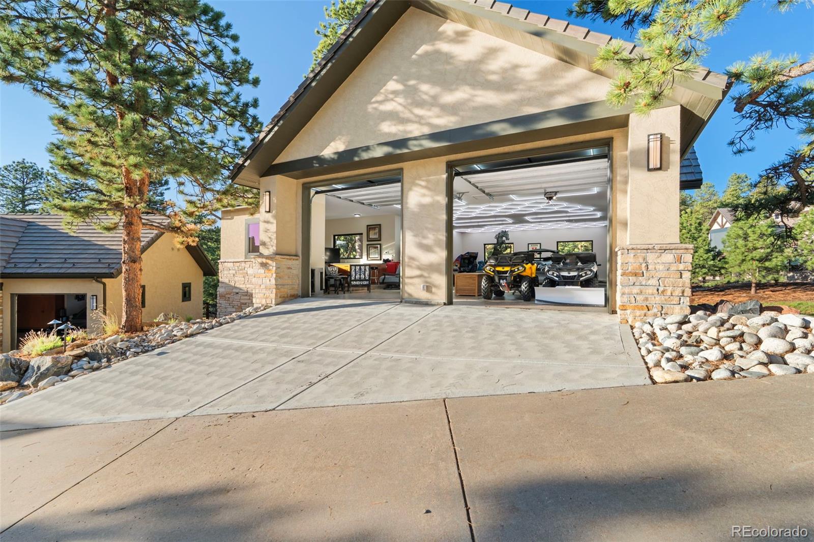 730 Genesee Mountain Road Golden, CO 80401 - Photo 46 of 50 a view of a building with cars parked