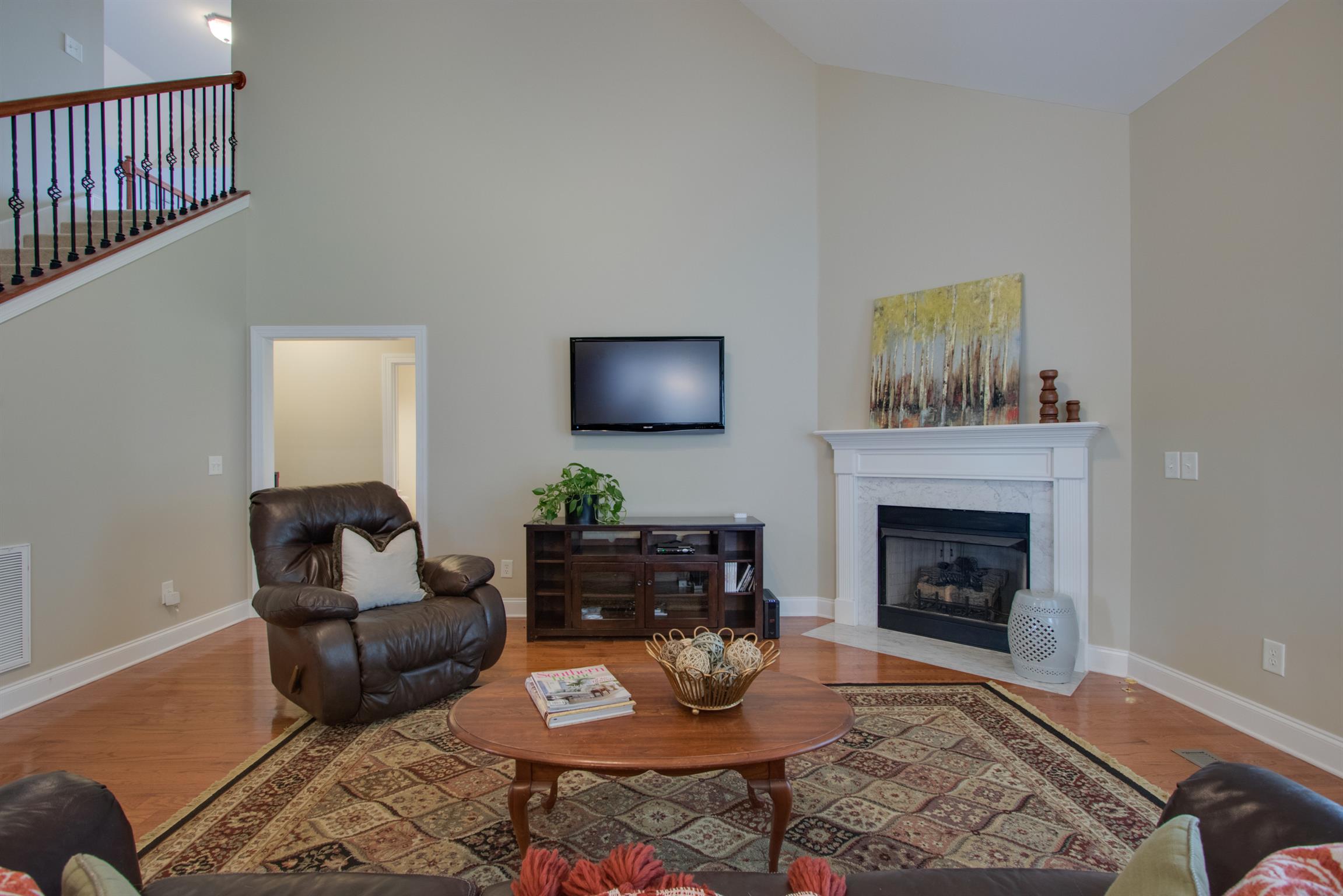 75 Abbey Road Lebanon, TN 37090 - Photo 14 of 30 a living room with furniture and a fireplace