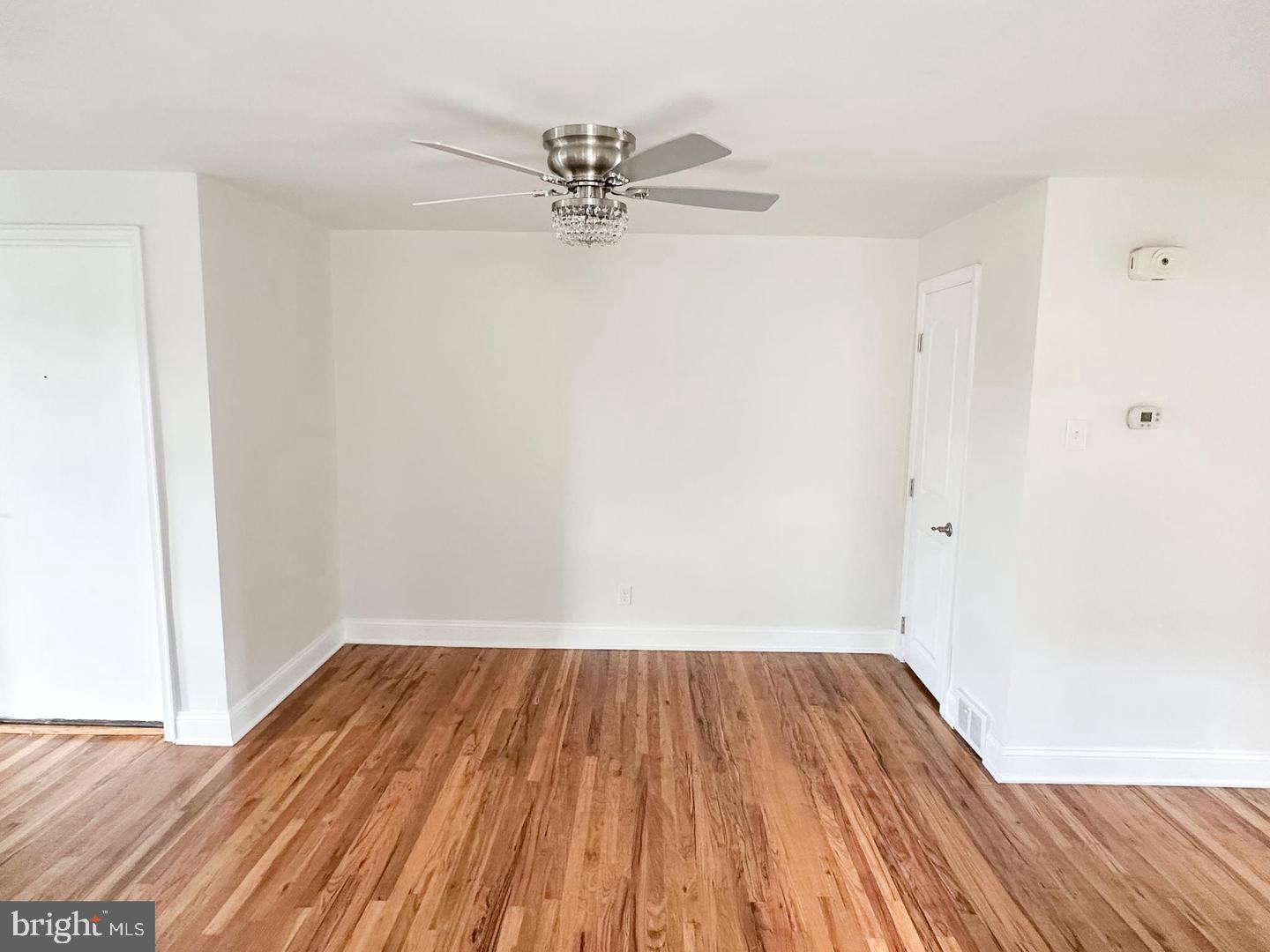 104 Clement Road, Unit D Oreland, PA 19075 - Photo 5 of 9 a view of a room with wooden floor