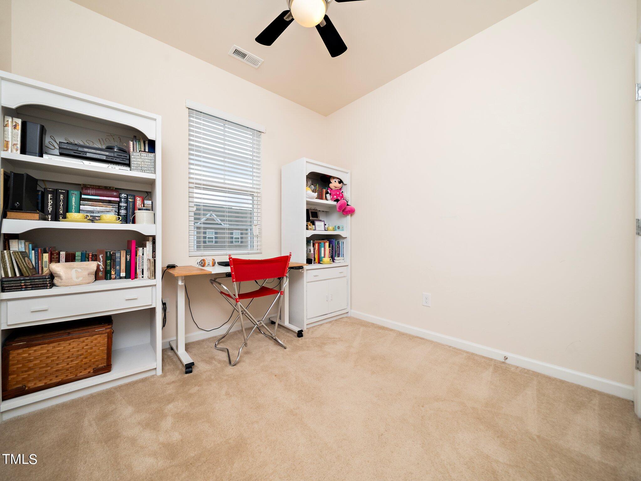 8804 Commons Townes Drive Raleigh, NC 27616 - Photo 17 of 21 a workspace with a window