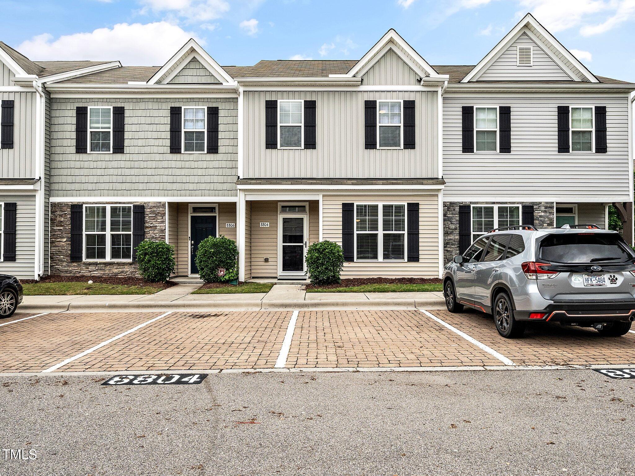 8804 Commons Townes Drive Raleigh, NC 27616 - Photo 2 of 21 front view of a house with a yard