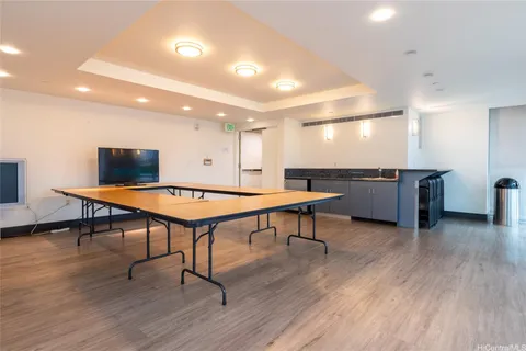 a room with furniture and a wooden floor