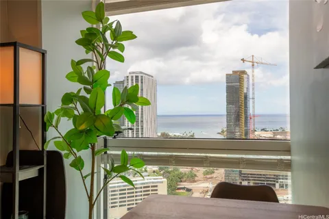 a view of a vase of flowers sitting on a table