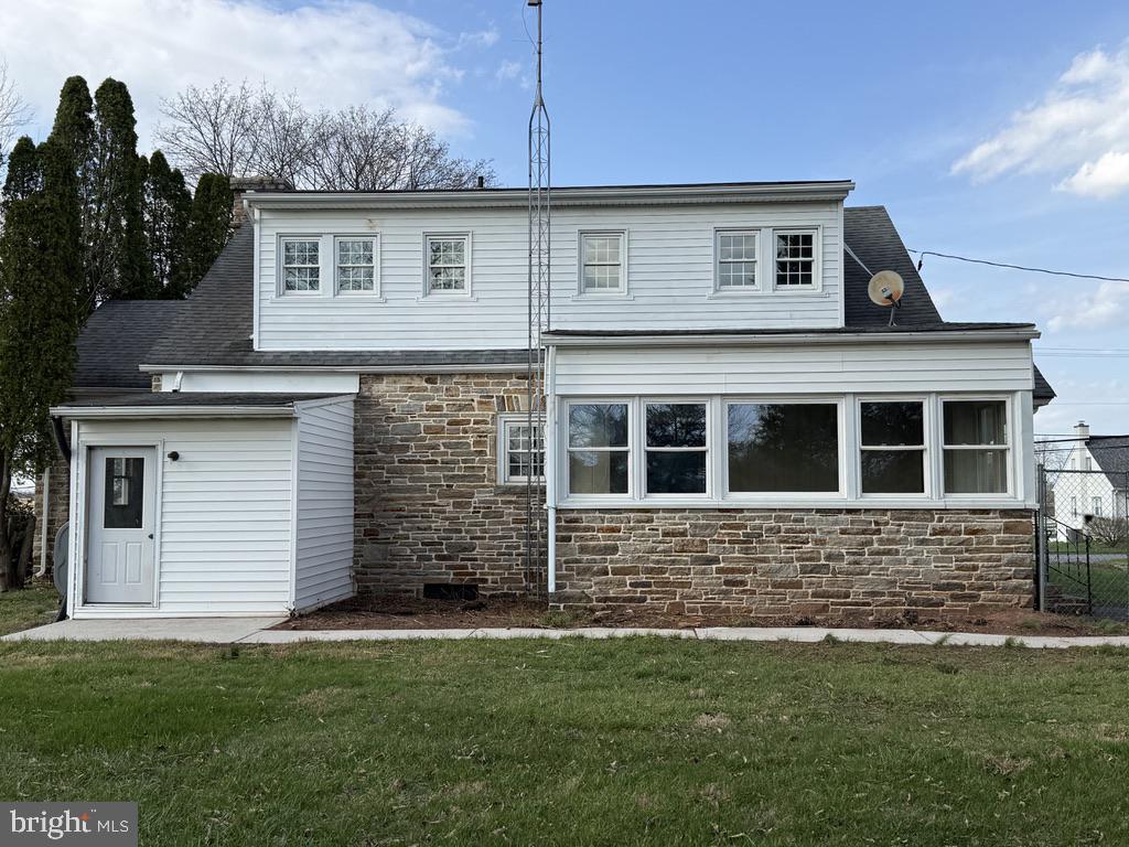6245 Middleburg Road Keymar, MD 21757 - Photo 24 of 77 a front view of a house with a garden