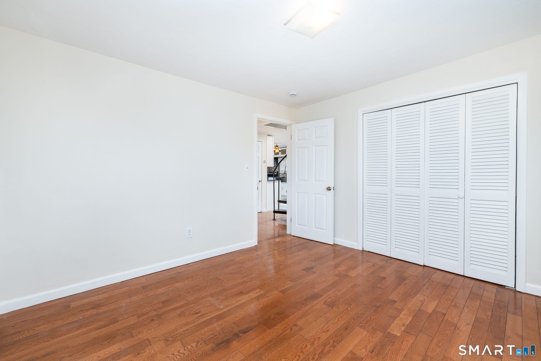 461 Pond Road Franklin, CT 06254 - Photo 19 of 35 wooden floor in an empty room