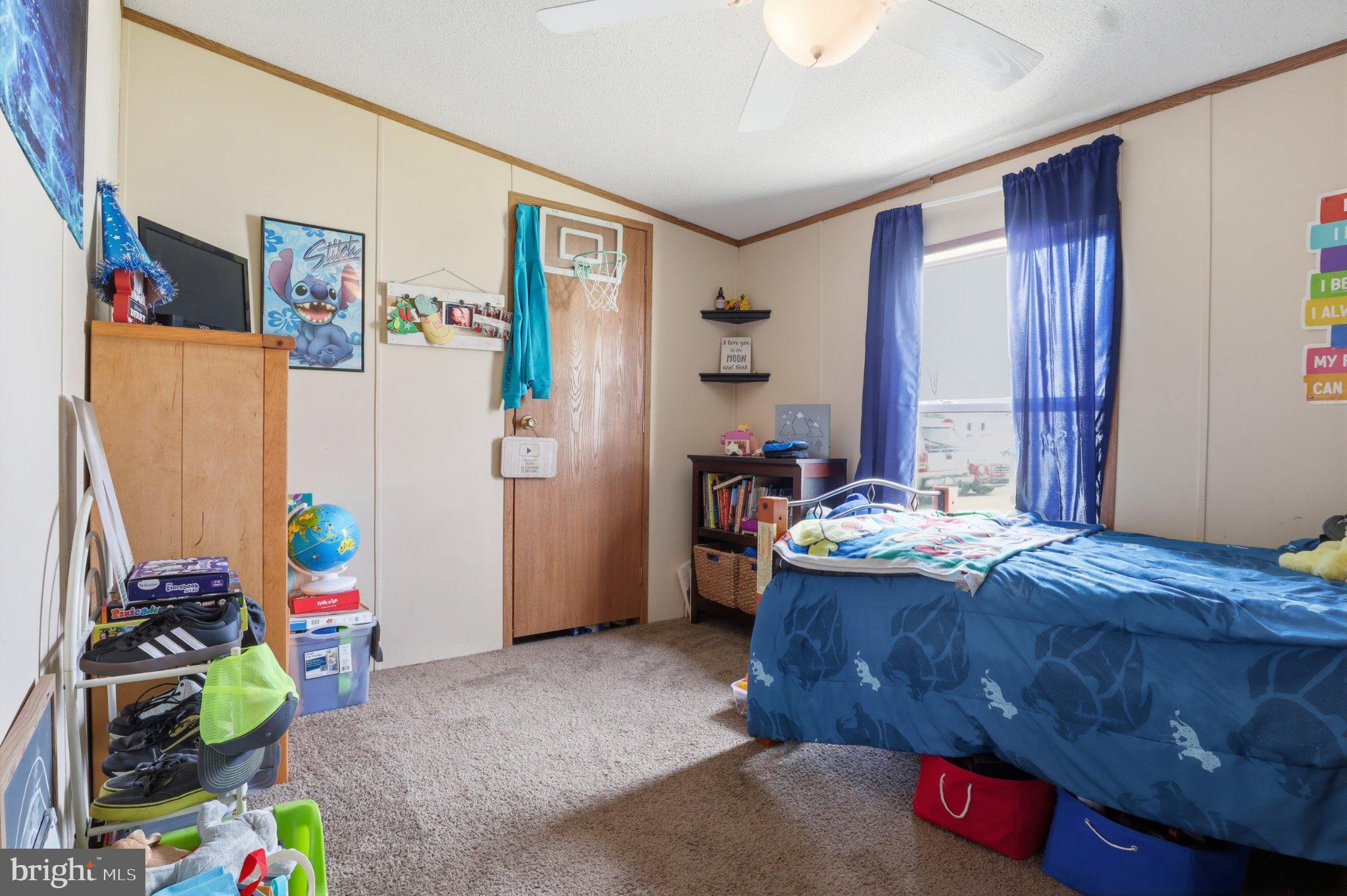 4820 Old Harrisburg Road, Unit 11 Gettysburg, PA 17325 - Photo 13 of 29 a bedroom with bed and a window