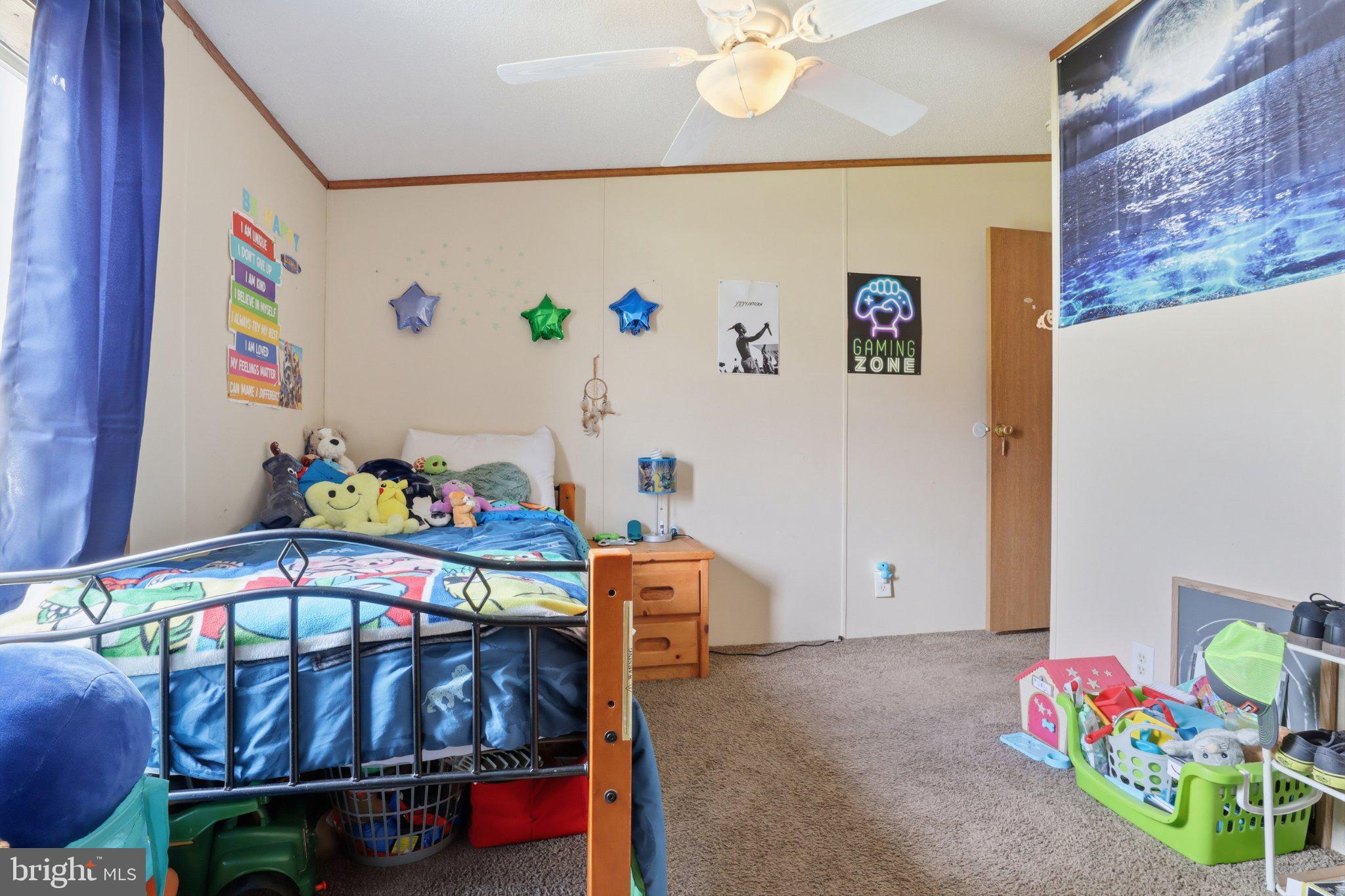 4820 Old Harrisburg Road, Unit 11 Gettysburg, PA 17325 - Photo 14 of 29 a bedroom with furniture and a bed
