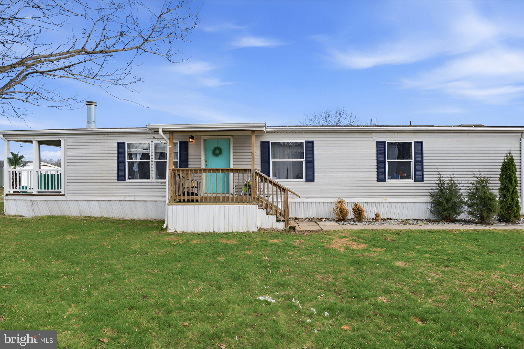 4820 Old Harrisburg Road, Unit 11 Gettysburg, PA 17325 - Photo 2 of 29 a house view with a sitting space and garden