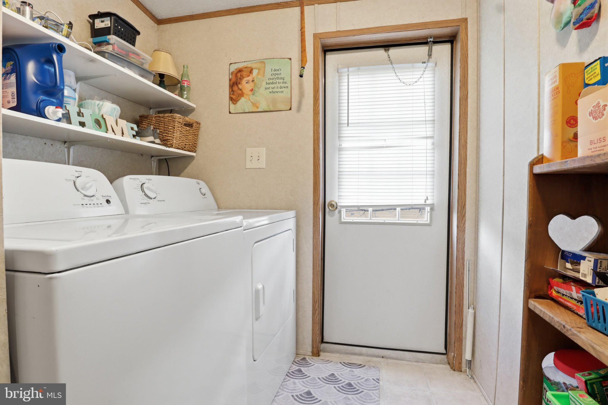 4820 Old Harrisburg Road, Unit 11 Gettysburg, PA 17325 - Photo 21 of 29 a utility room with dryer and washer