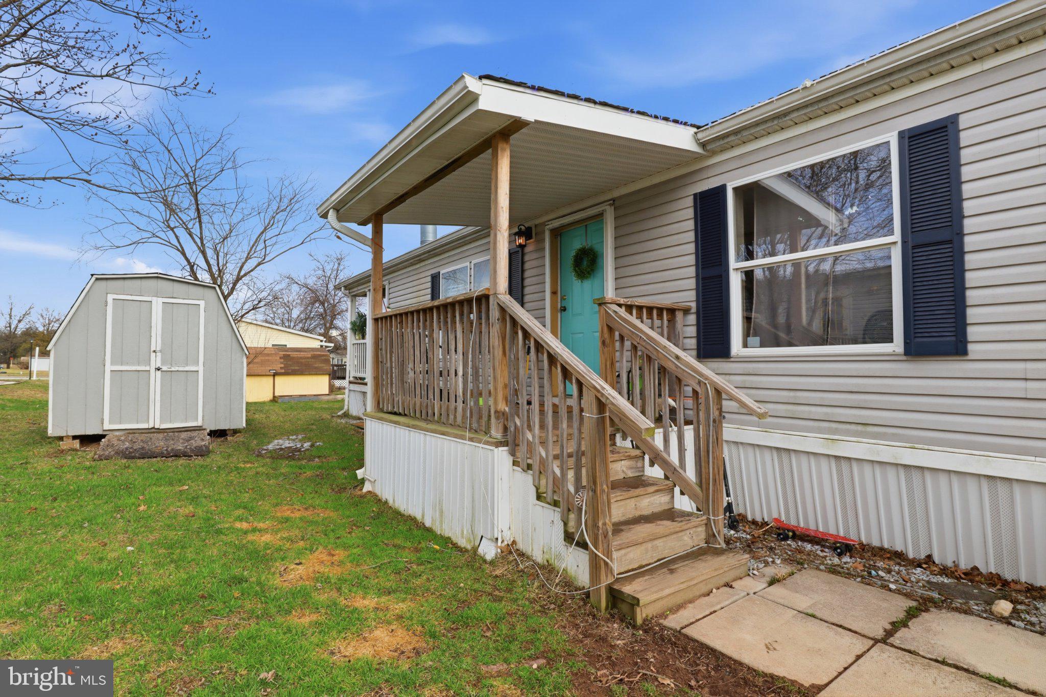 4820 Old Harrisburg Road, Unit 11 Gettysburg, PA 17325 - Photo 3 of 29 a view of a house with backyard and white wall