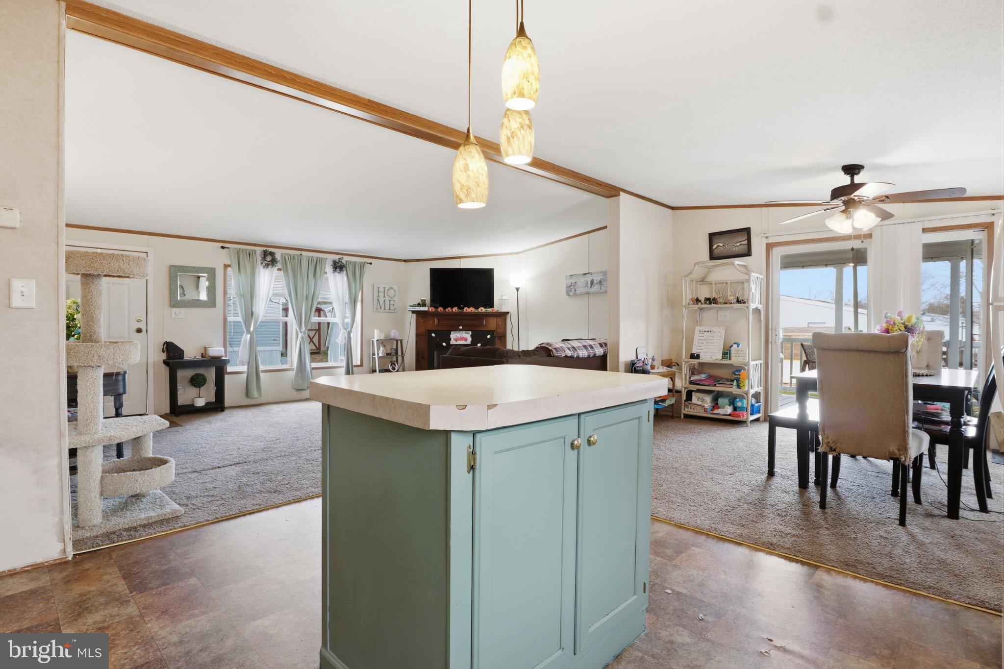 4820 Old Harrisburg Road, Unit 11 Gettysburg, PA 17325 - Photo 8 of 29 a view of kitchen with kitchen island a sink table and chairs