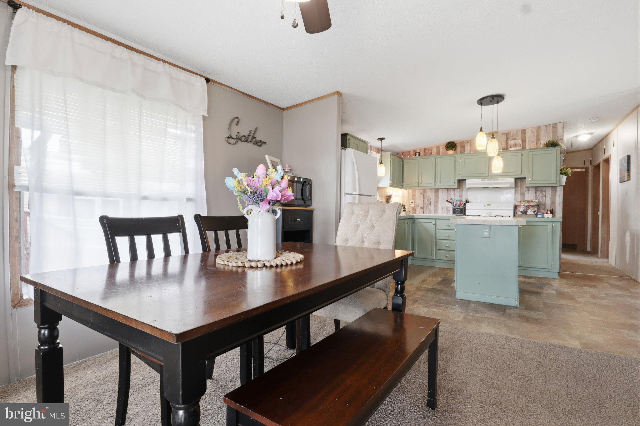 4820 Old Harrisburg Road, Unit 11 Gettysburg, PA 17325 - Photo 9 of 29 a kitchen with a table and chairs