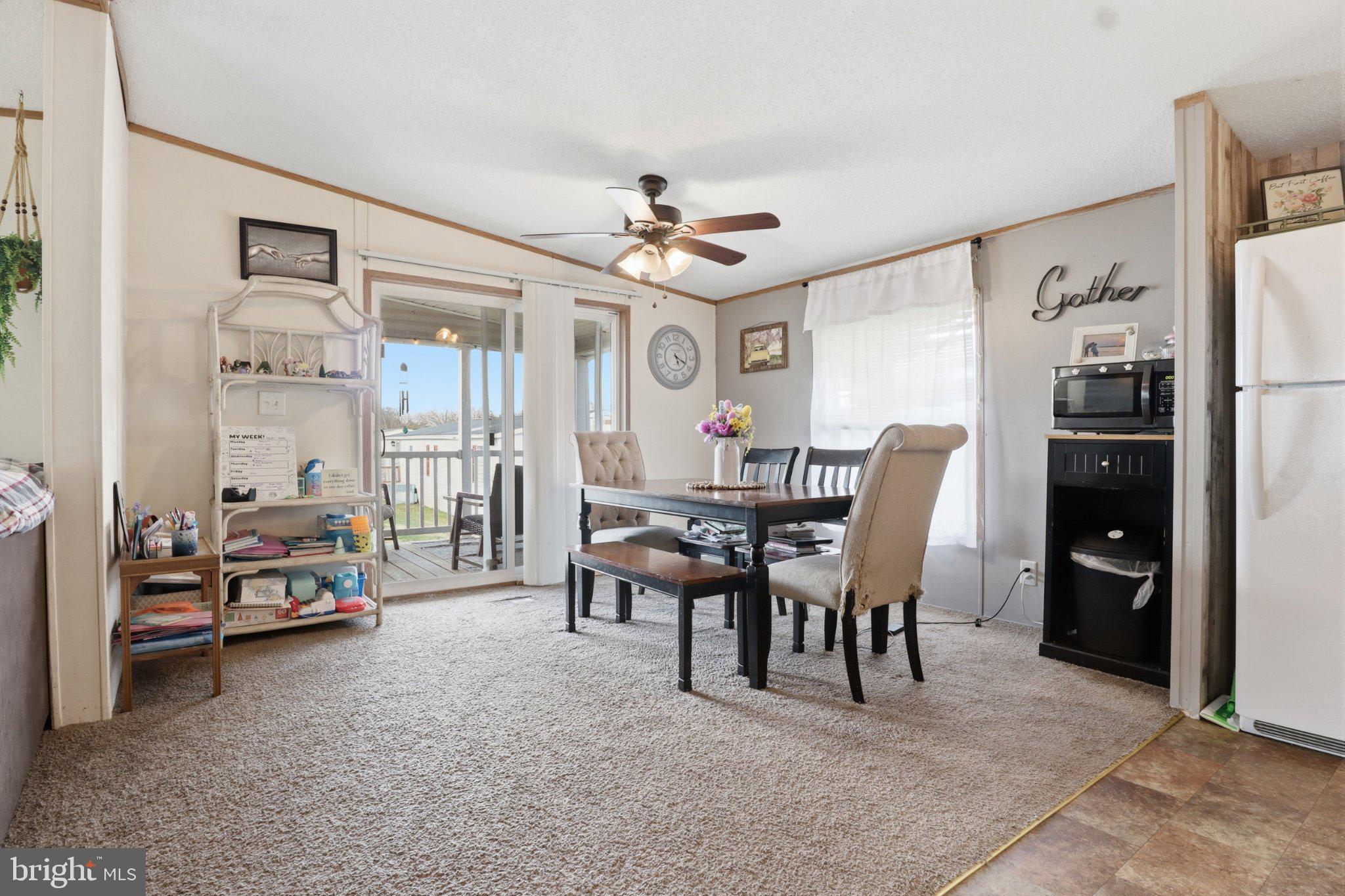 4820 Old Harrisburg Road, Unit 11 Gettysburg, PA 17325 - Photo 10 of 29 a view of a livingroom with furniture and a large window