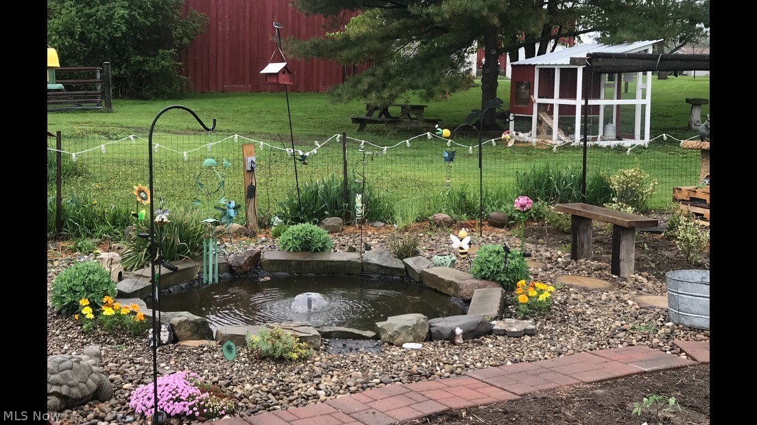 17031 Quarry Road Wellington, OH 44090 - Photo 30 of 31 small pond landscape