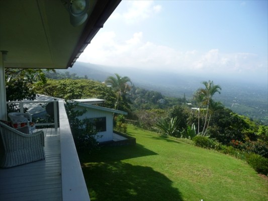 82-6061 Captain Cook Village Road Captain Cook, HI 96704 - Photo 6 of 16 a view of a patio with plants and a garden