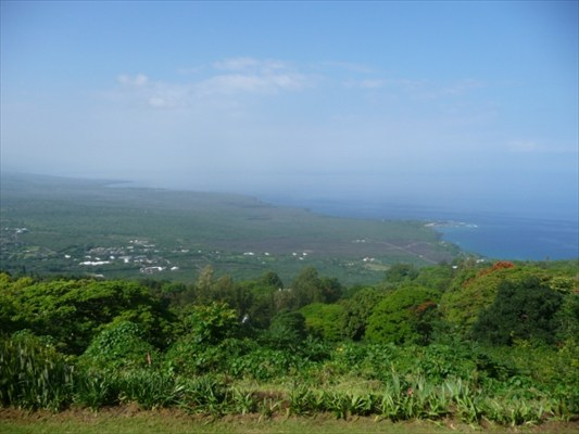 82-6061 Captain Cook Village Road Captain Cook, HI 96704 - Photo 8 of 16 a view of a city with lush green forest