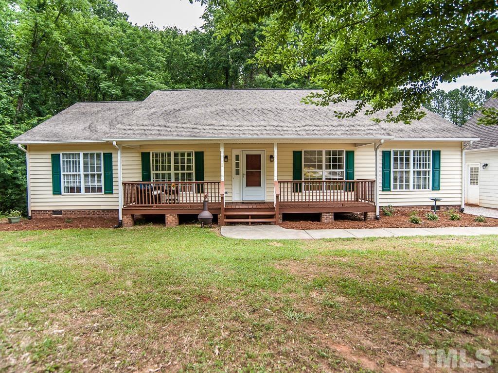 4900 Raytown Road Raleigh, NC 27613 - Photo 2 of 34 a backyard of a house with seating space