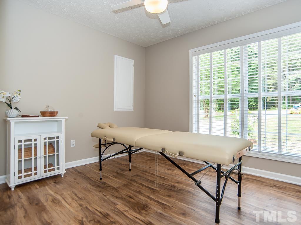 4900 Raytown Road Raleigh, NC 27613 - Photo 24 of 34 a living room with furniture and a window