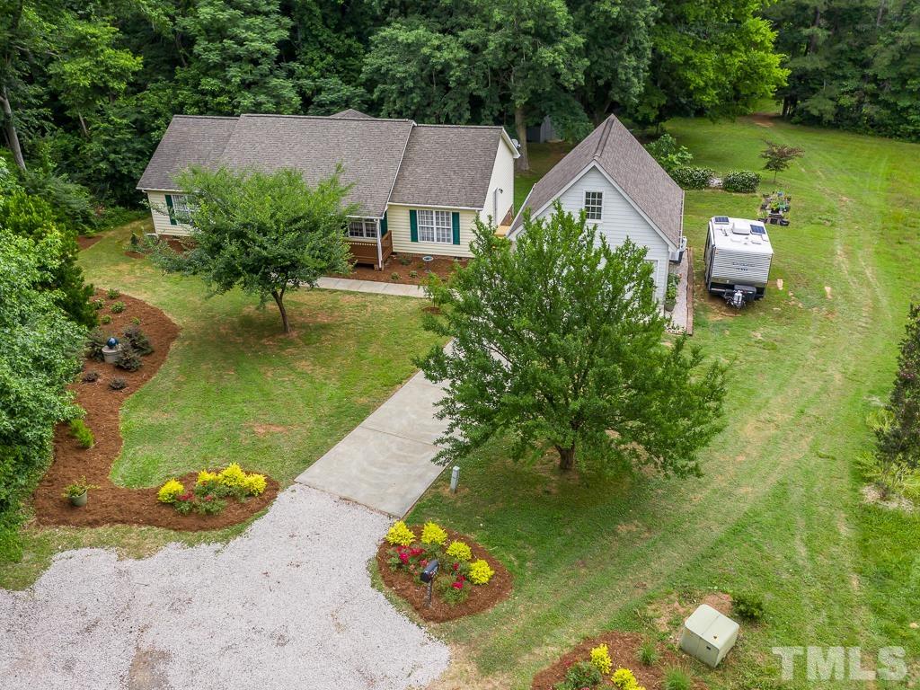 4900 Raytown Road Raleigh, NC 27613 - Photo 30 of 34 a aerial view of a house with a yard basket ball court and outdoor seating